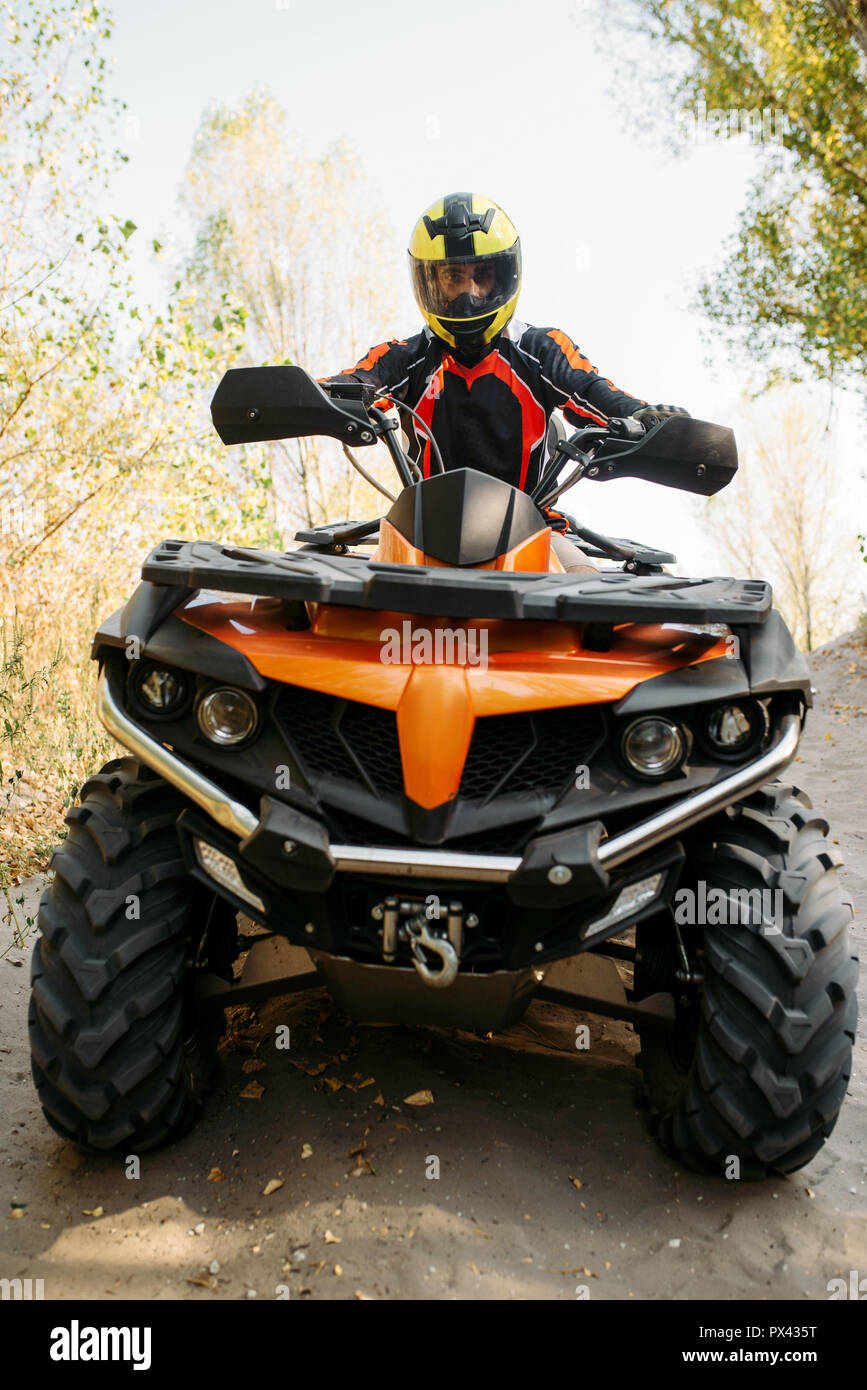 Man on quad with helmet hires stock photography and images Alamy
