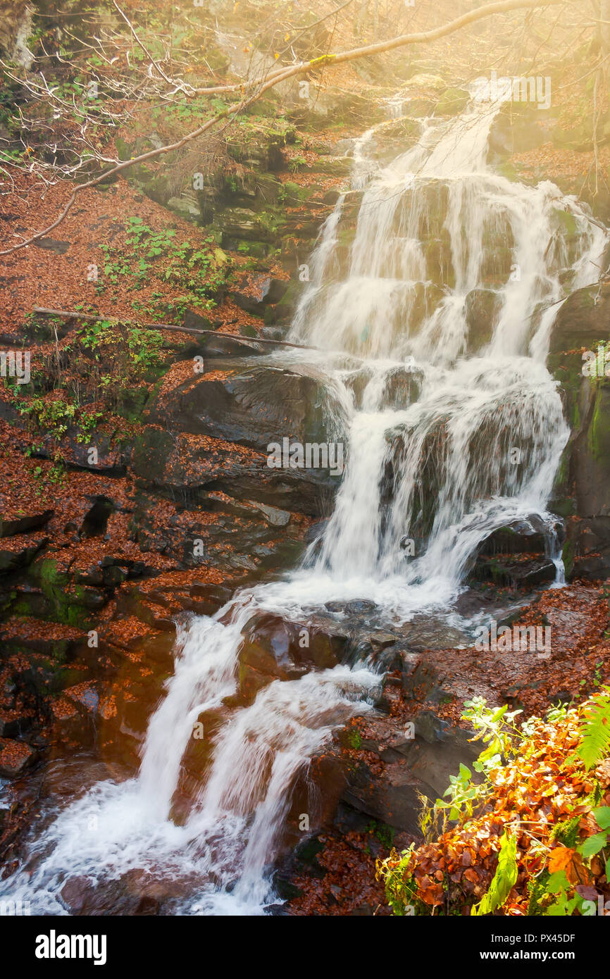 waterfall Shypot in gorgeous evening light. beautiful autumn scenery of Carpathian nature wonders Stock Photo