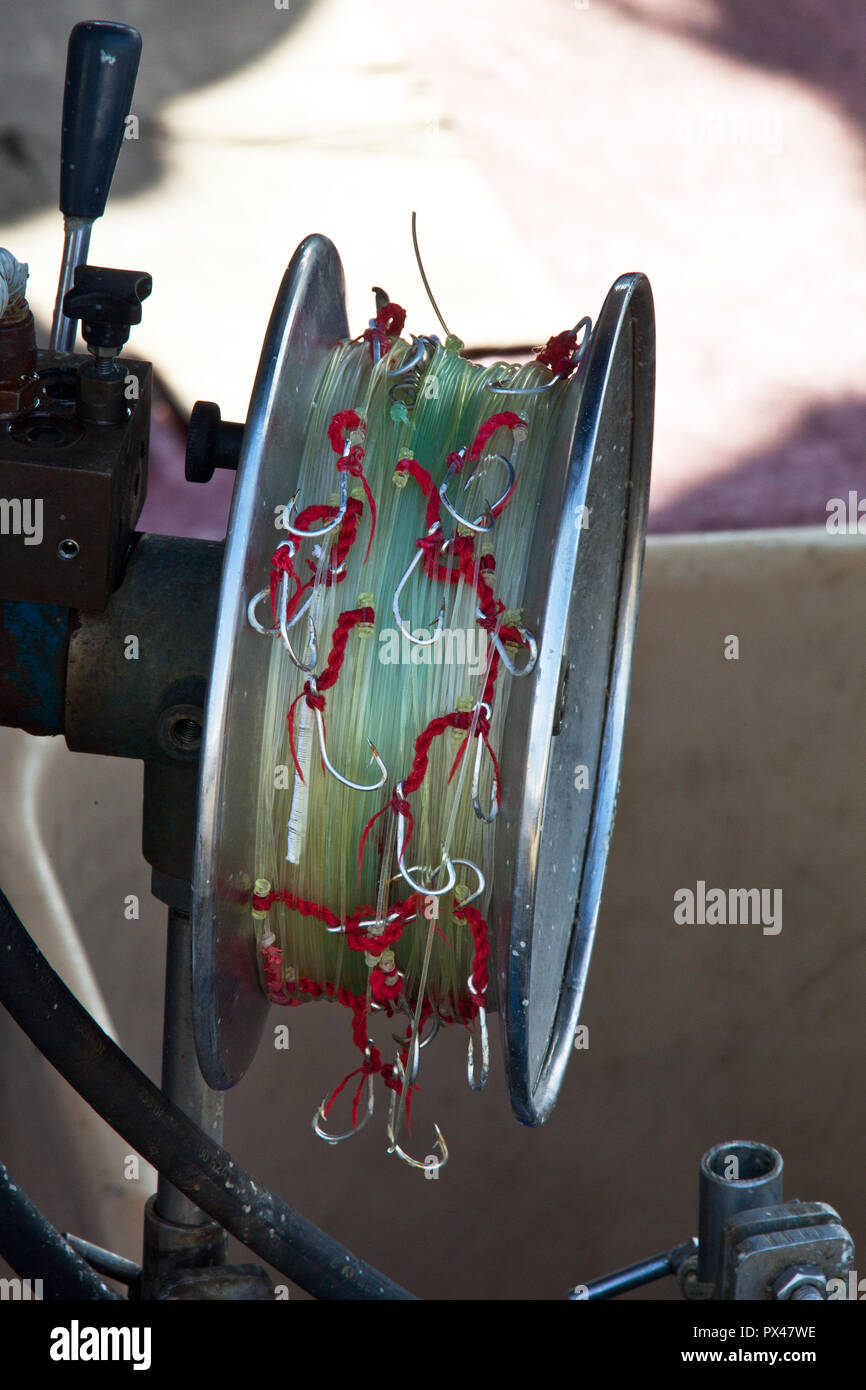 reel fishing with hooks and lures Stock Photo Alamy
