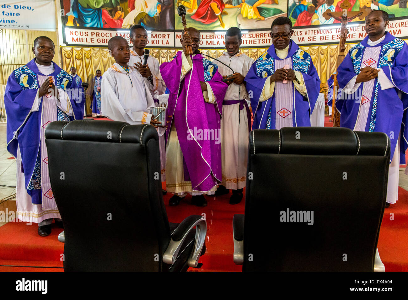 Celebration for the 20th anniversary of Radio Maria in Cristo Risorto de Hedzranawoe catholic parish church, LomÃ©, Togo. Armchairs offered to the rad Stock Photo