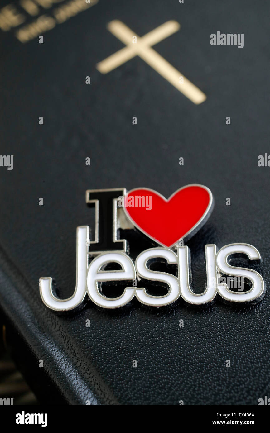 I Love Jesus pin with the Holy Bible. Stock Photo