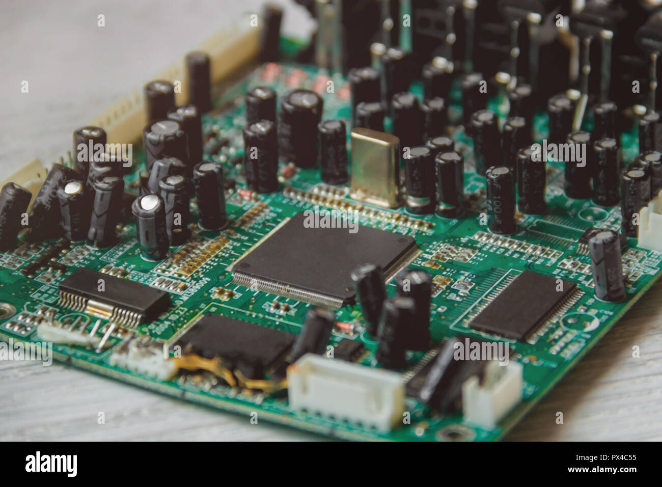 Printed Circuit Board with many electrical components Stock Photo - Alamy