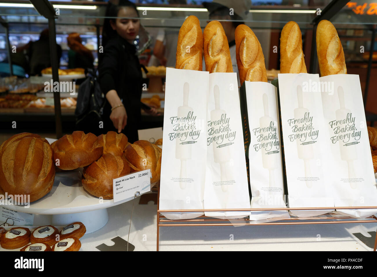 Fresh french bread ( baguette ) for sale in bakery.  Ho Chi Minh City. Vietnam. Stock Photo