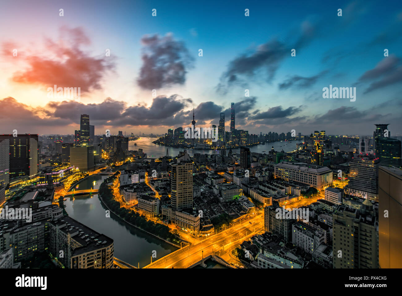 Aerial view of Shanghai China with the traffic light trail at the night ...