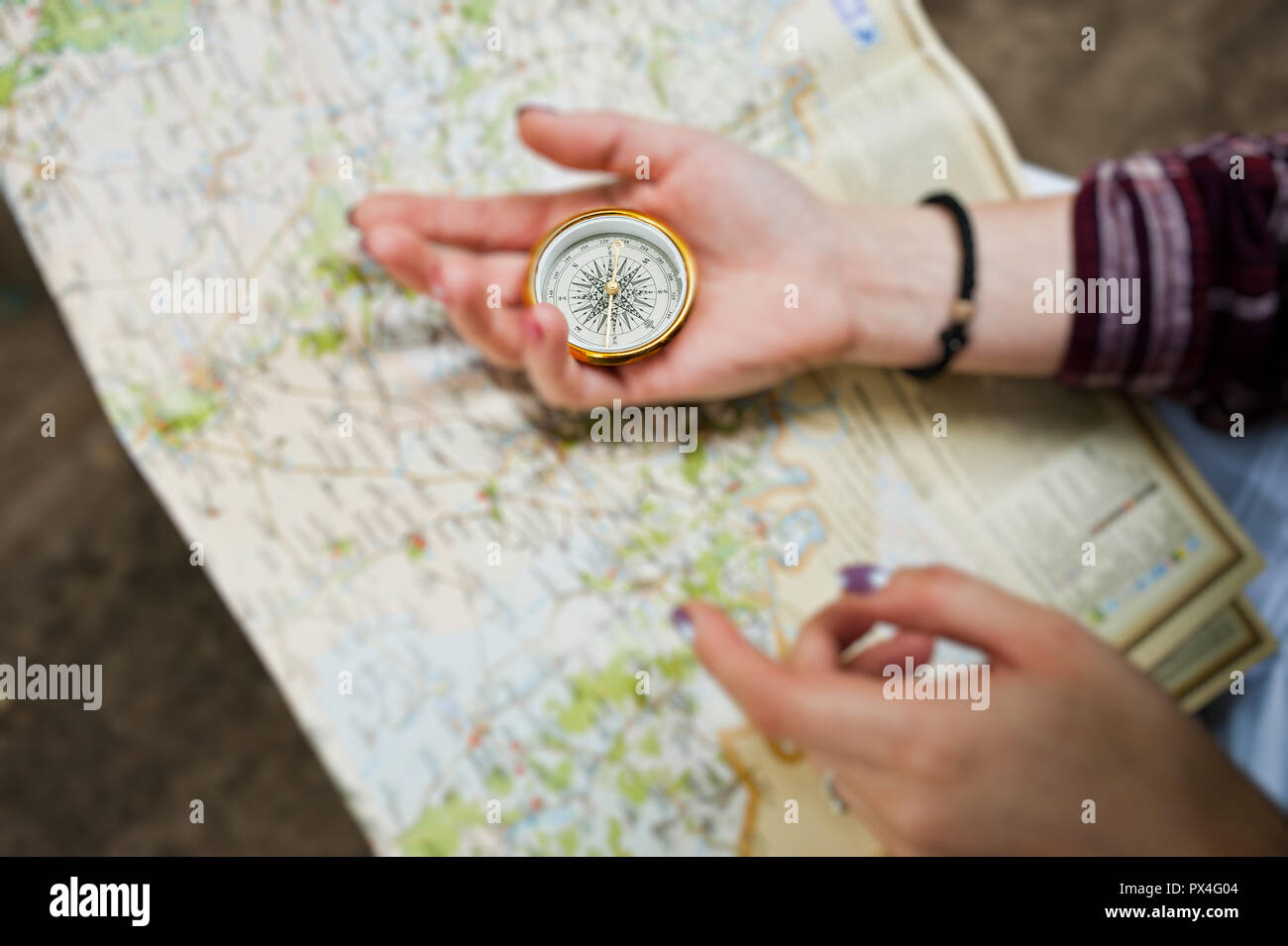 Female tourist compass on hi-res stock photography and images - Alamy
