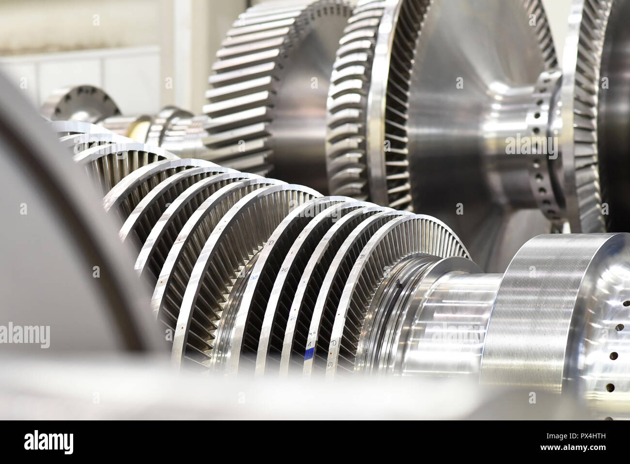production of modern gas turbines in an industrial plant - closeup of the turbine made of steel Stock Photo