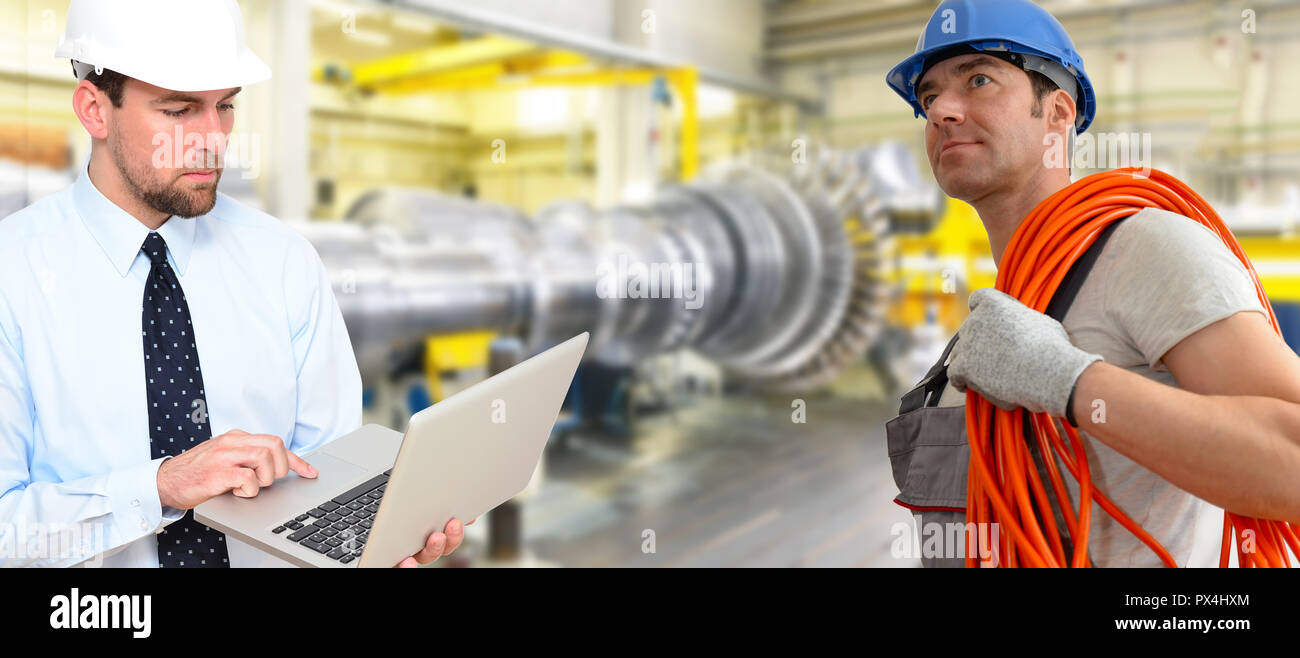 workers assembling and constructing gas turbines in a modern industrial factory Stock Photo