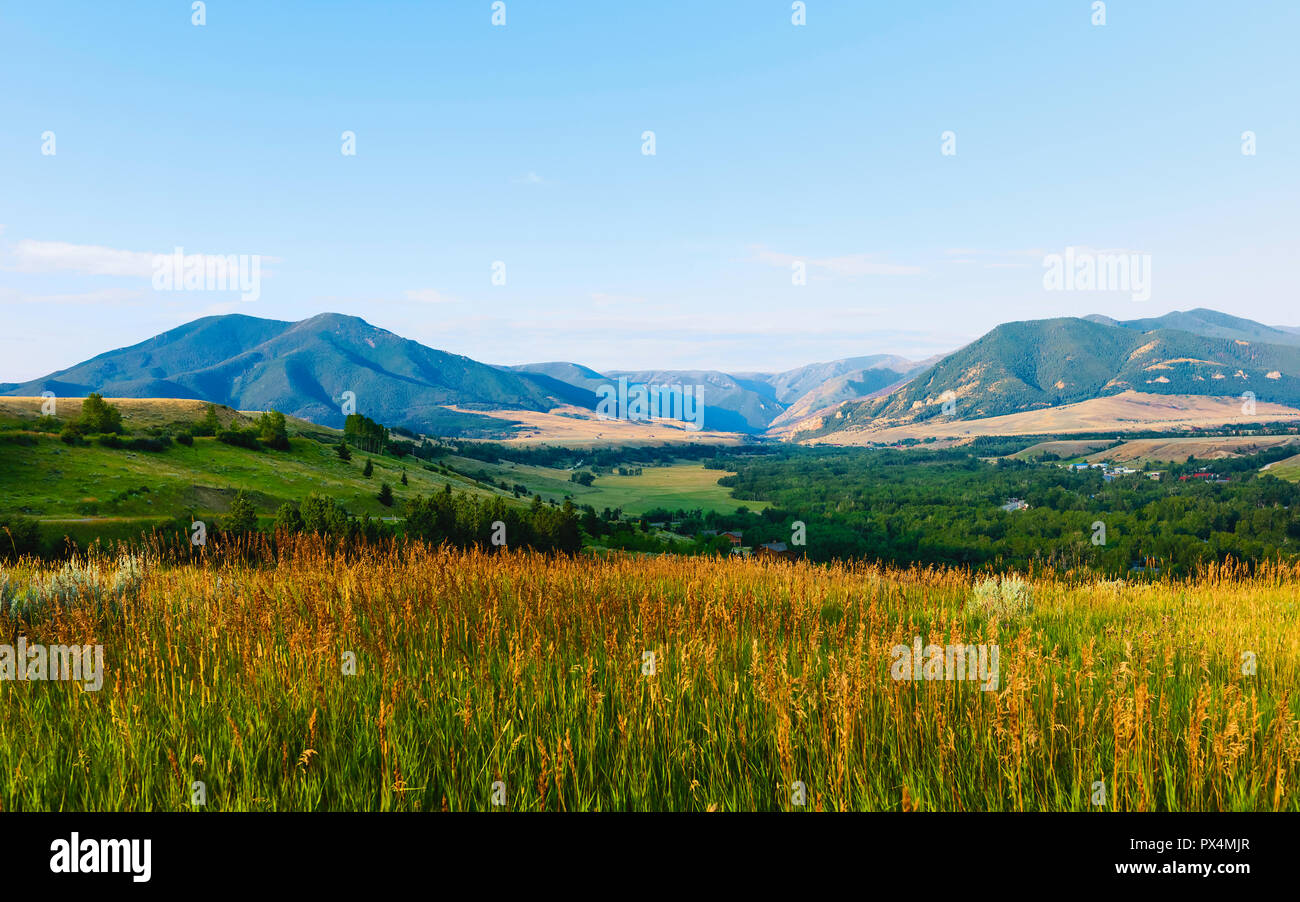 The foothills of the Bear Tooth Mountains at dawn as seen from the Bear Tooth Mountain Pass Highway on a fine summer morning in Montana, USA. Stock Photo