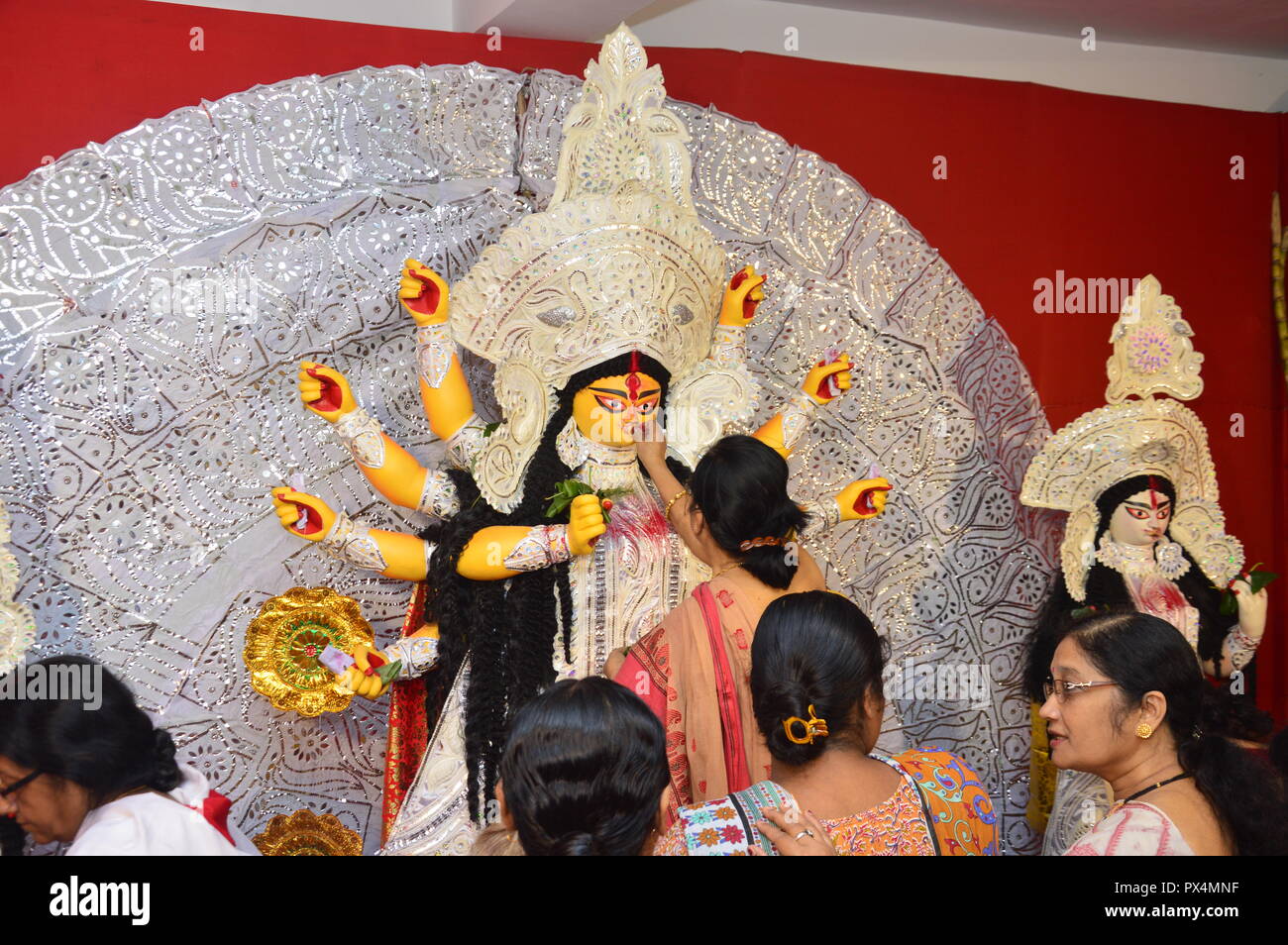 Durga Puja / Navratri in kolkata, India ends with the celebration of 'Sindoor Khela'. ('vermillion game'). Hindu women specially bengali women smear e Stock Photo
