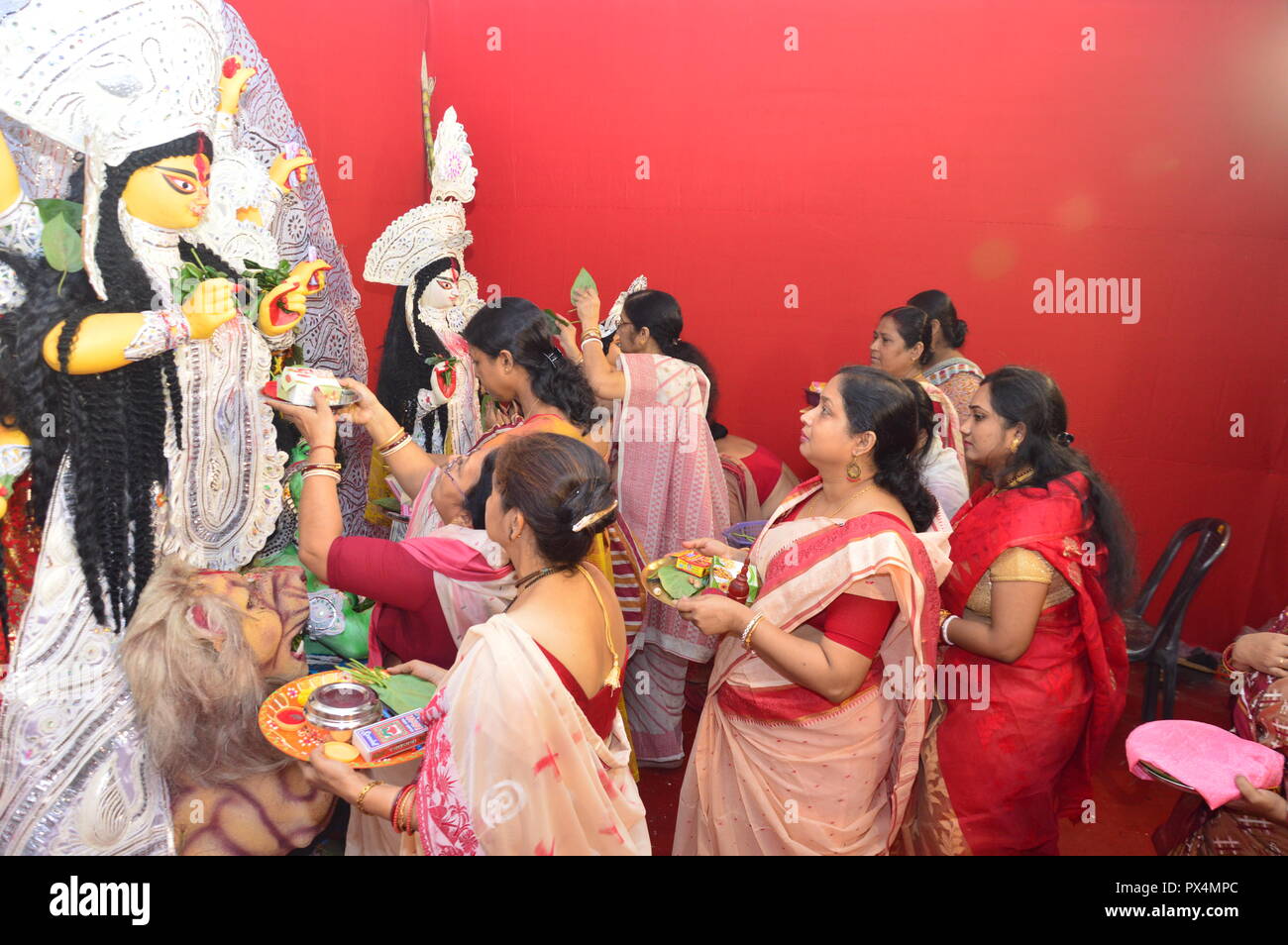 Durga Puja / Navratri in kolkata, India ends with the celebration of 'Sindoor Khela'. ('vermillion game'). Hindu women specially bengali women smear e Stock Photo