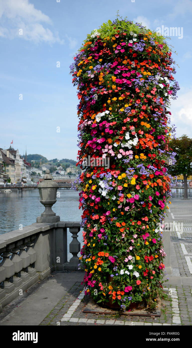 Flower tower in the town of Lucern on the Lucern lake shore. Stock Photo