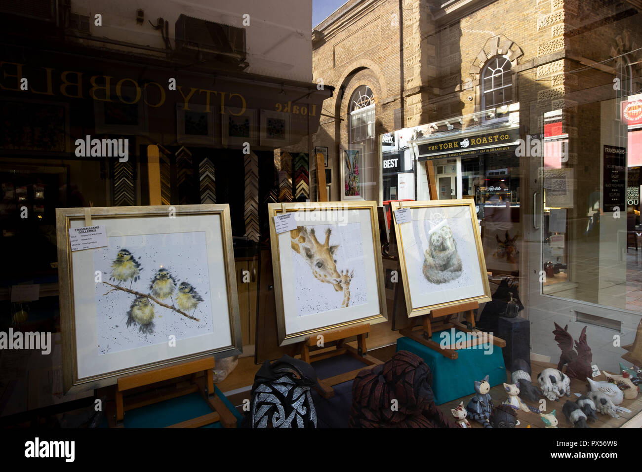 print and picture framing shop window display Stock Photo Alamy