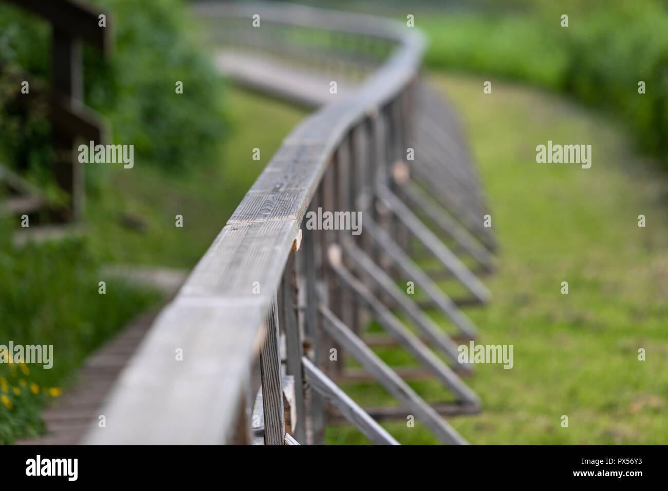 Rails of a wooden pathway Stock Photo - Alamy