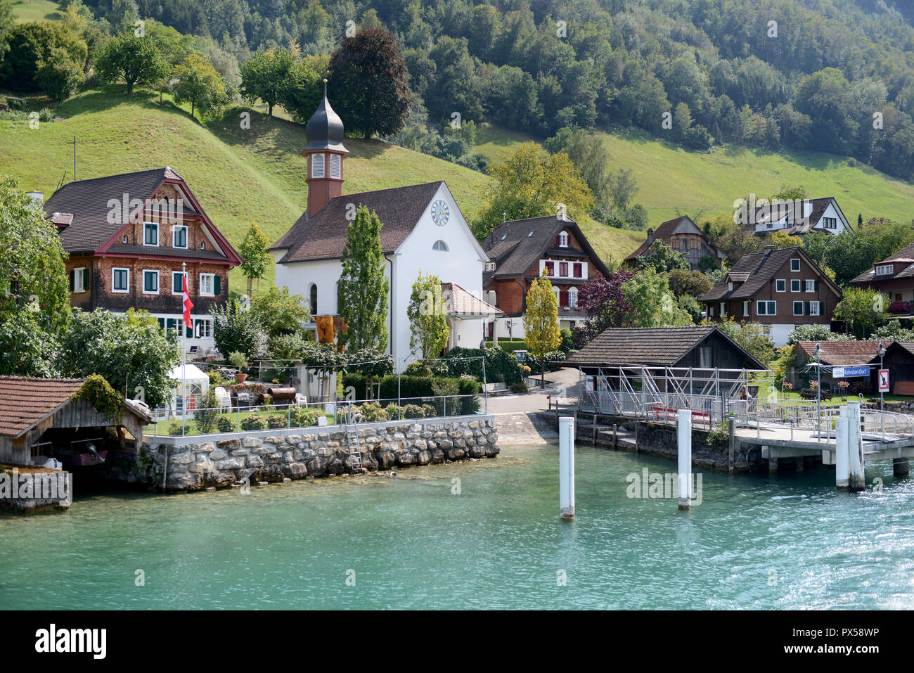 village Kehrsiten-dorf on the shores of Lake Lucern Stock Photo