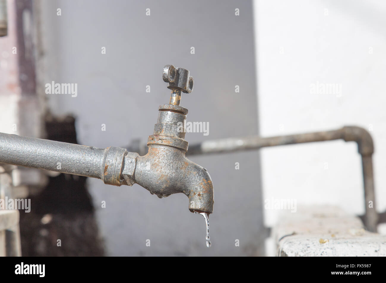 water dripping from open tap Stock Photo Alamy