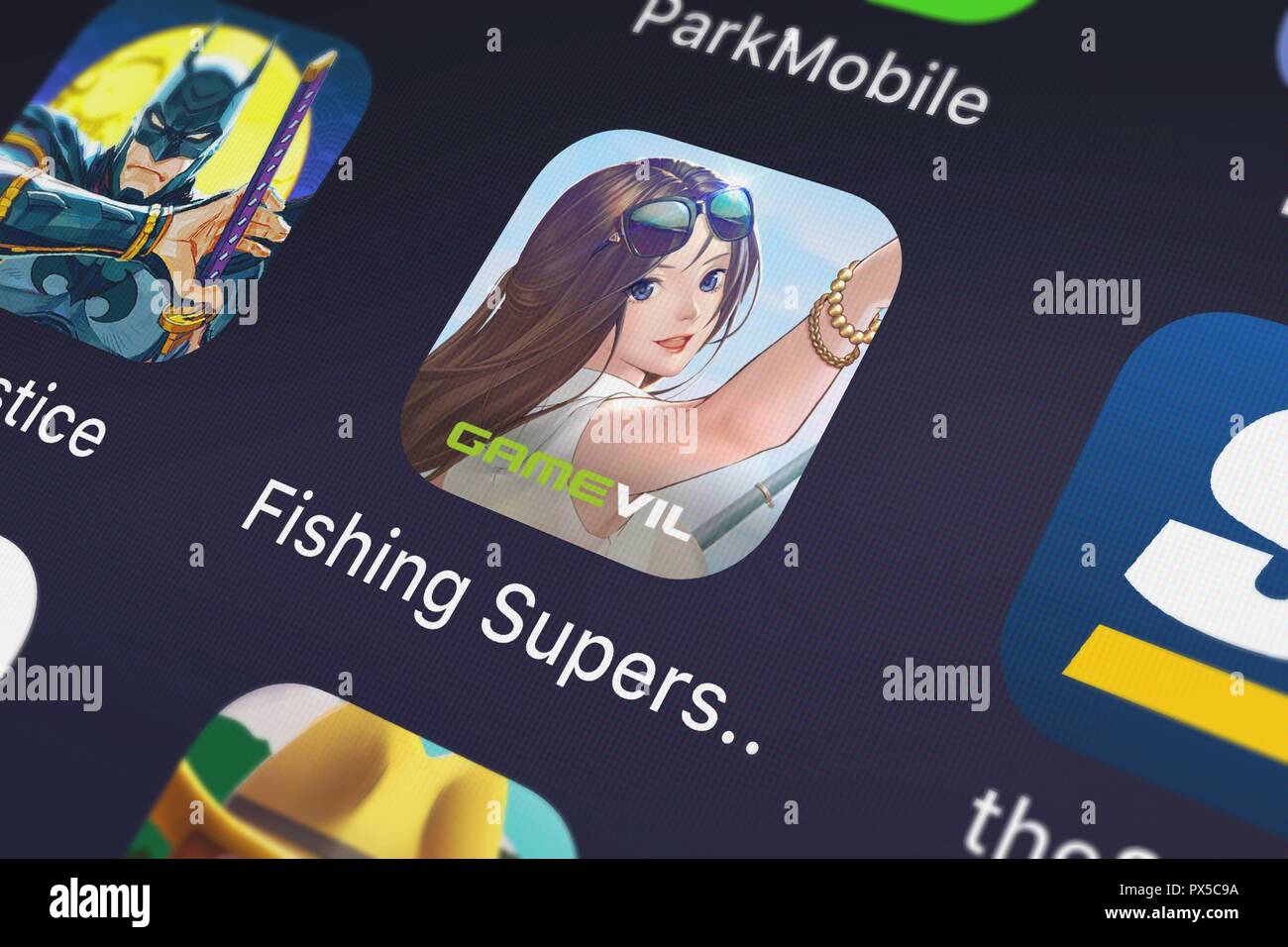 London, United Kingdom - October 19, 2018: Close-up of the Fishing Superstars : Season 5 icon from GAMEVIL Inc. on an iPhone. Stock Photo