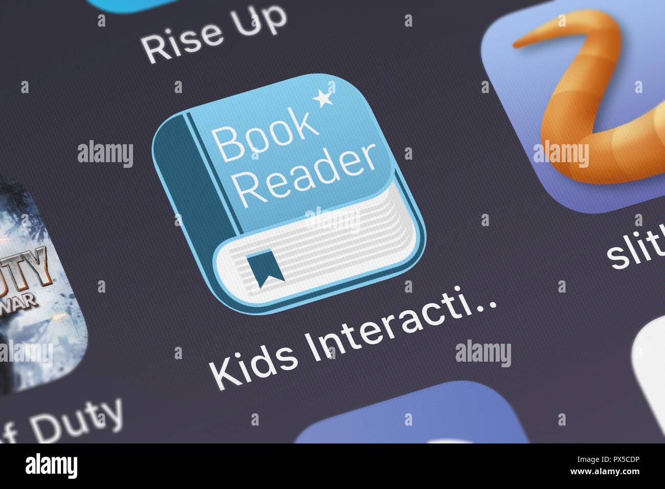 London, United Kingdom - October 19, 2018: Close-up shot of the Kids Interactive Book Reader application icon from Appgeneration Software on an iPhone Stock Photo