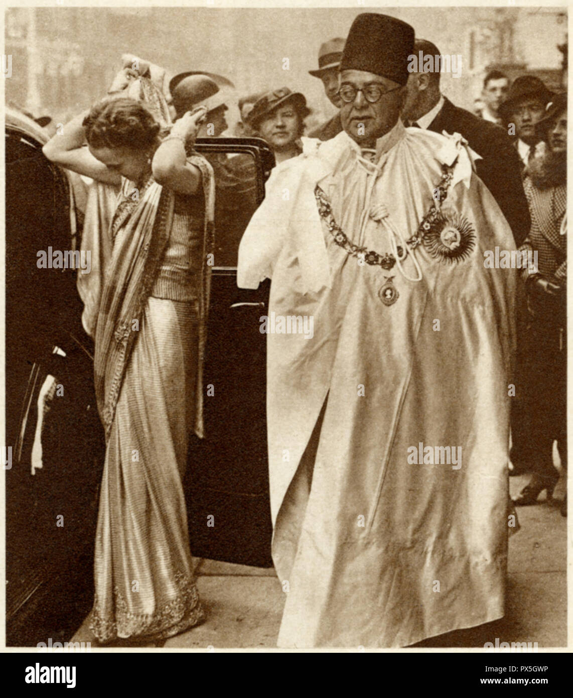 Sir Sultan Muhammed Shah, Aga Khan III with his wife the Begum Aga Khan attending the coronation of King George the sixth at Westminster Abbey on May 12 1937. He was the 48th Imam of the Nizari Ismaili religion and was the co-founder and the first president of the All India Muslim League AIML Stock Photo