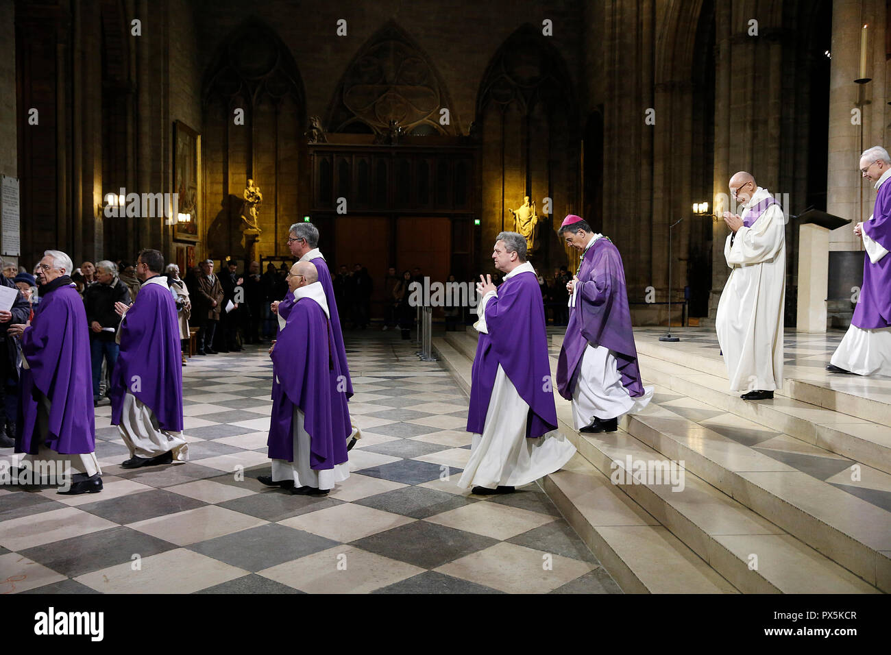 Ash wednesday celebration at Notre Dame cathedral, Paris, France. Exit procession. Stock Photo