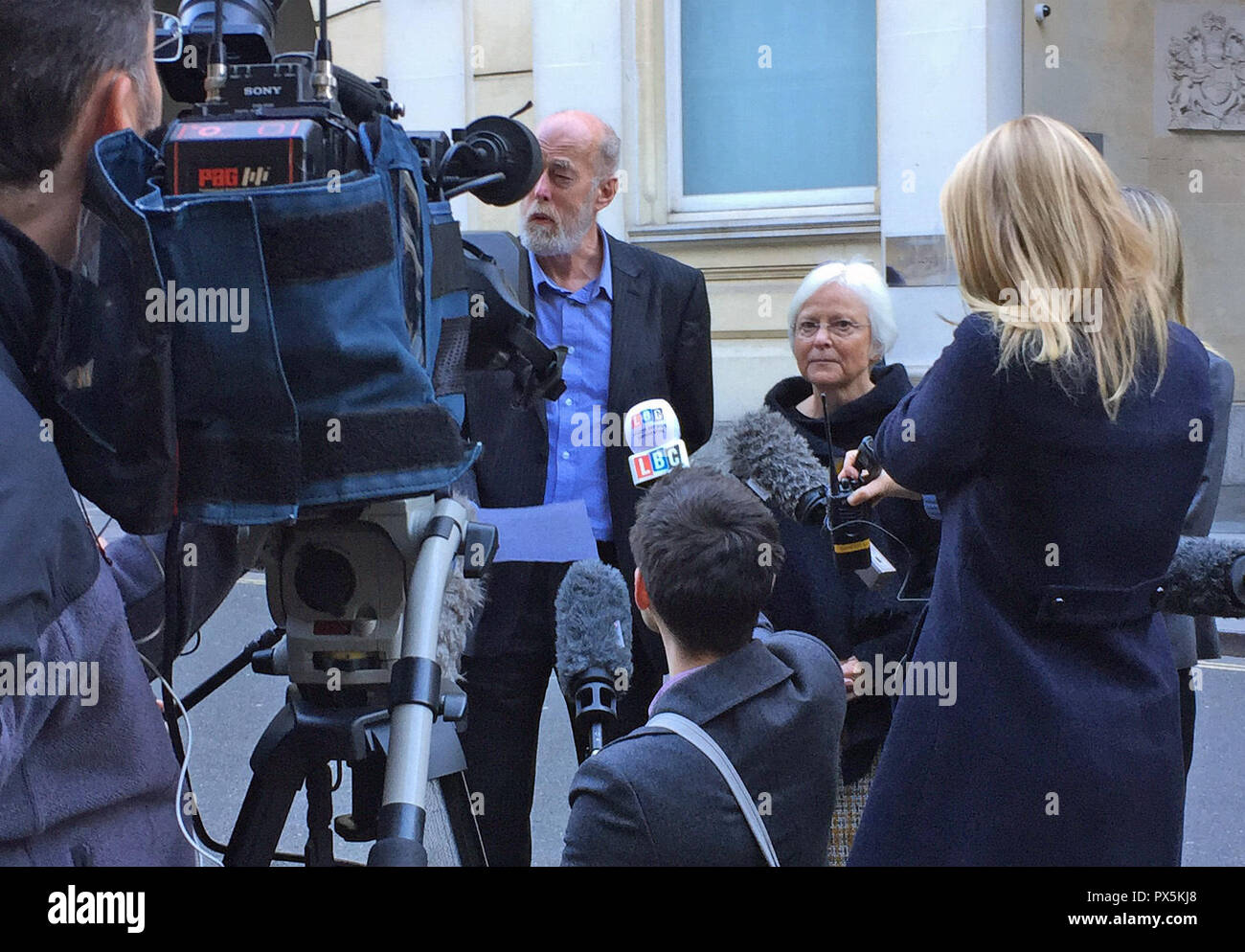 Thomas Orchard's father Ken and mother Alison Orchard speak to the media outside Bristol Crown Court after Devon and Cornwall Police pleaded guilty to health and safety breaches following the death of their son, who died in custody in October 2012. Stock Photo