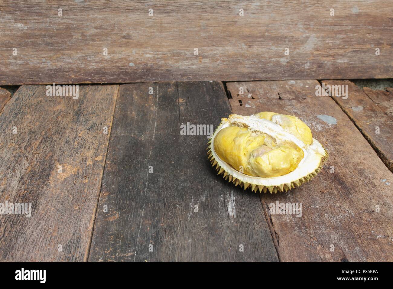 durian peeled ripe close up, King of fruit Thailand on the wooden table ...