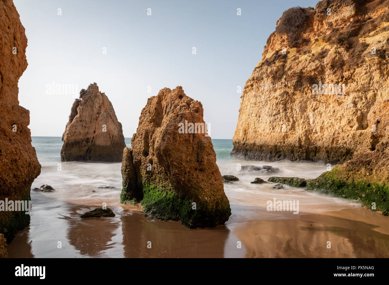Rock formations at Praia dos Tres Irmaos, Lagoa, Algarve, Portugal Stock Photo