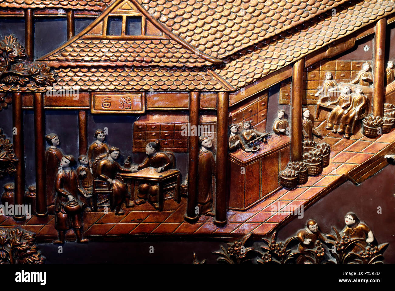 Museum of Traditional Vietnamese Medicine. Wood carved relief of
