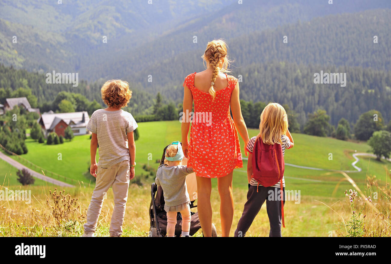 Young woman with kids in mountains, Tatras, Slovakia Stock Photo