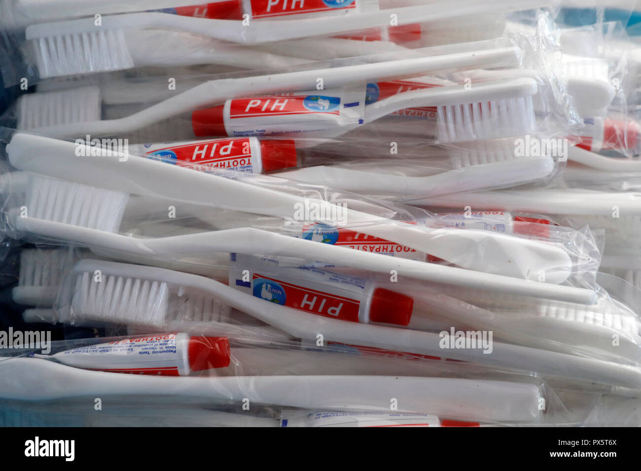 Close-Up Of White Plastic Toothbrushes.  Ho Chi Minh City. Vietnam. Stock Photo