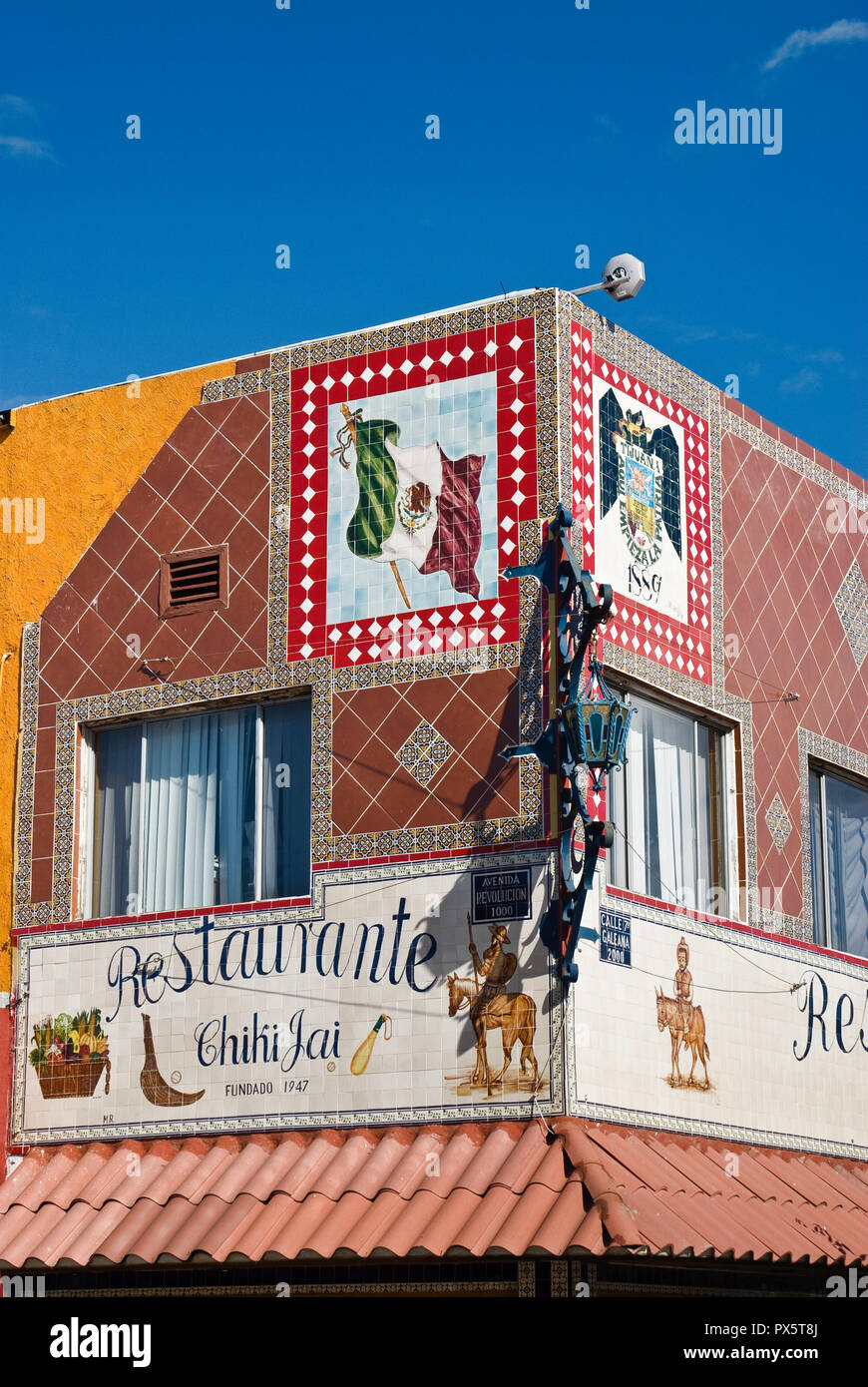 Mexican flag and Tijuana coat of arms in restaurant tile sign at Avenida Revolucion, Tijuana, Baja California, Mexico Stock Photo