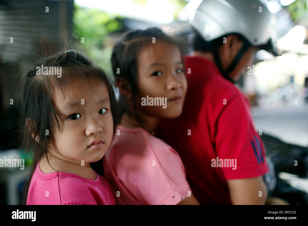 Vietnamese family on a motorbike. Cai Be. Vietnam Stock Photo - Alamy