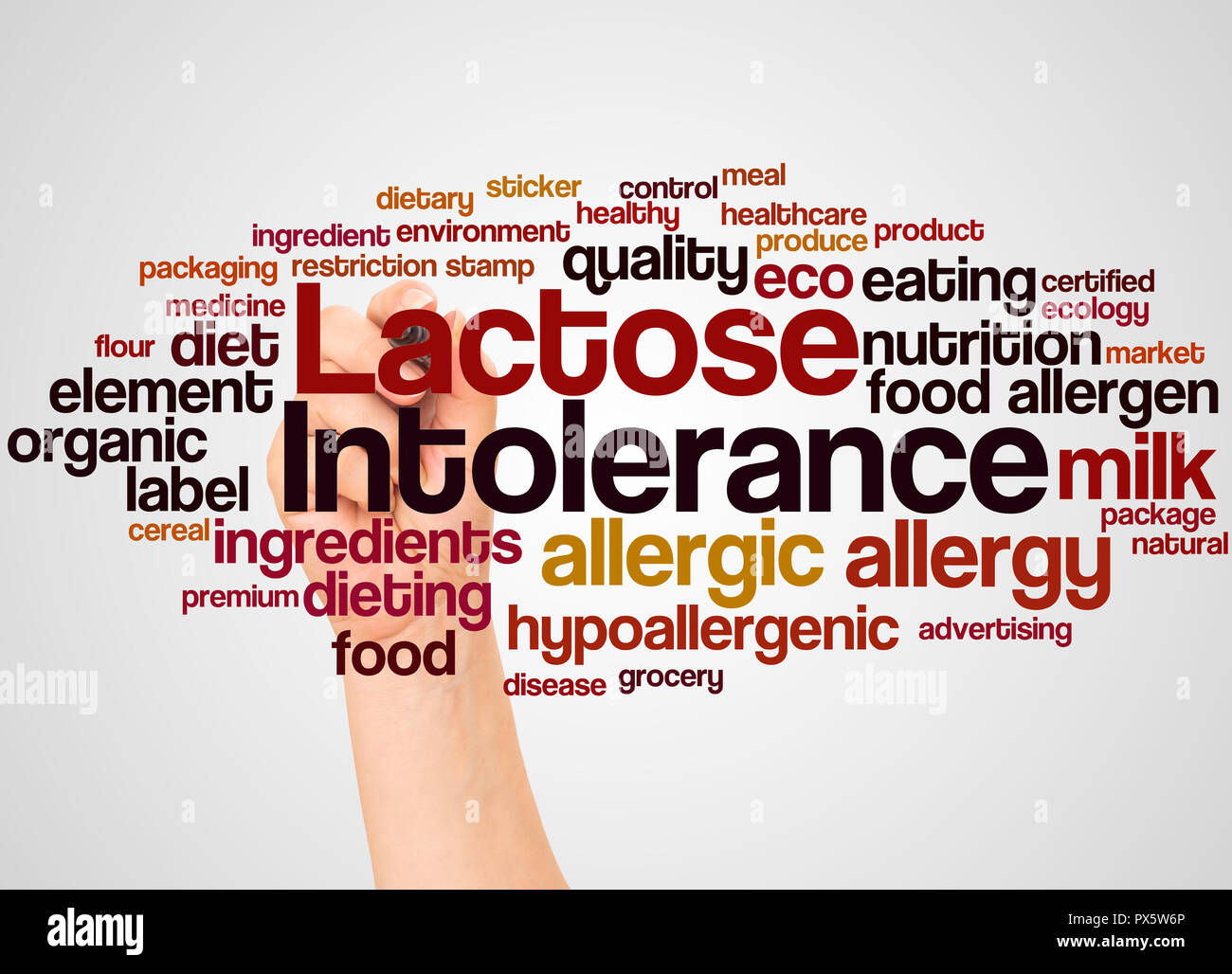 Lactose intolerance word cloud and hand with marker concept on white