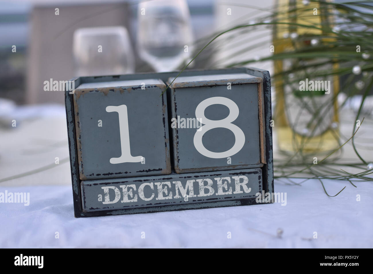 Wood blocks in box with date, day and month 18 December. Wooden blocks