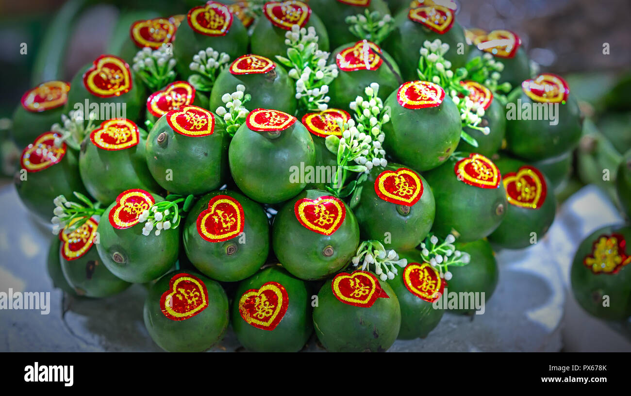 A buch of areca nut is bundled into bundles and decorated with beautiful patterns used to display fruit tray on the wedding day Stock Photo