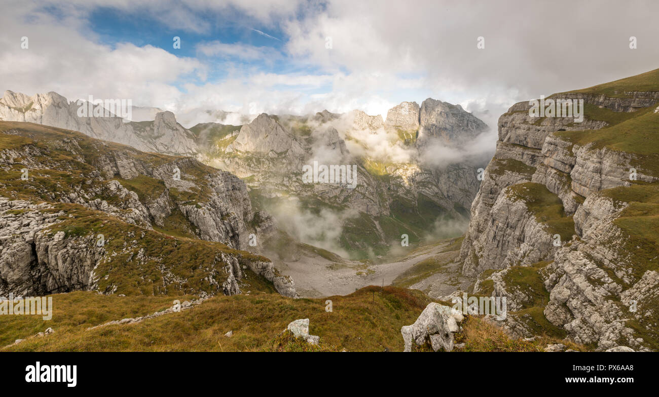 Panorama from the alpstein mountains, in the morning with fog. Stock Photo