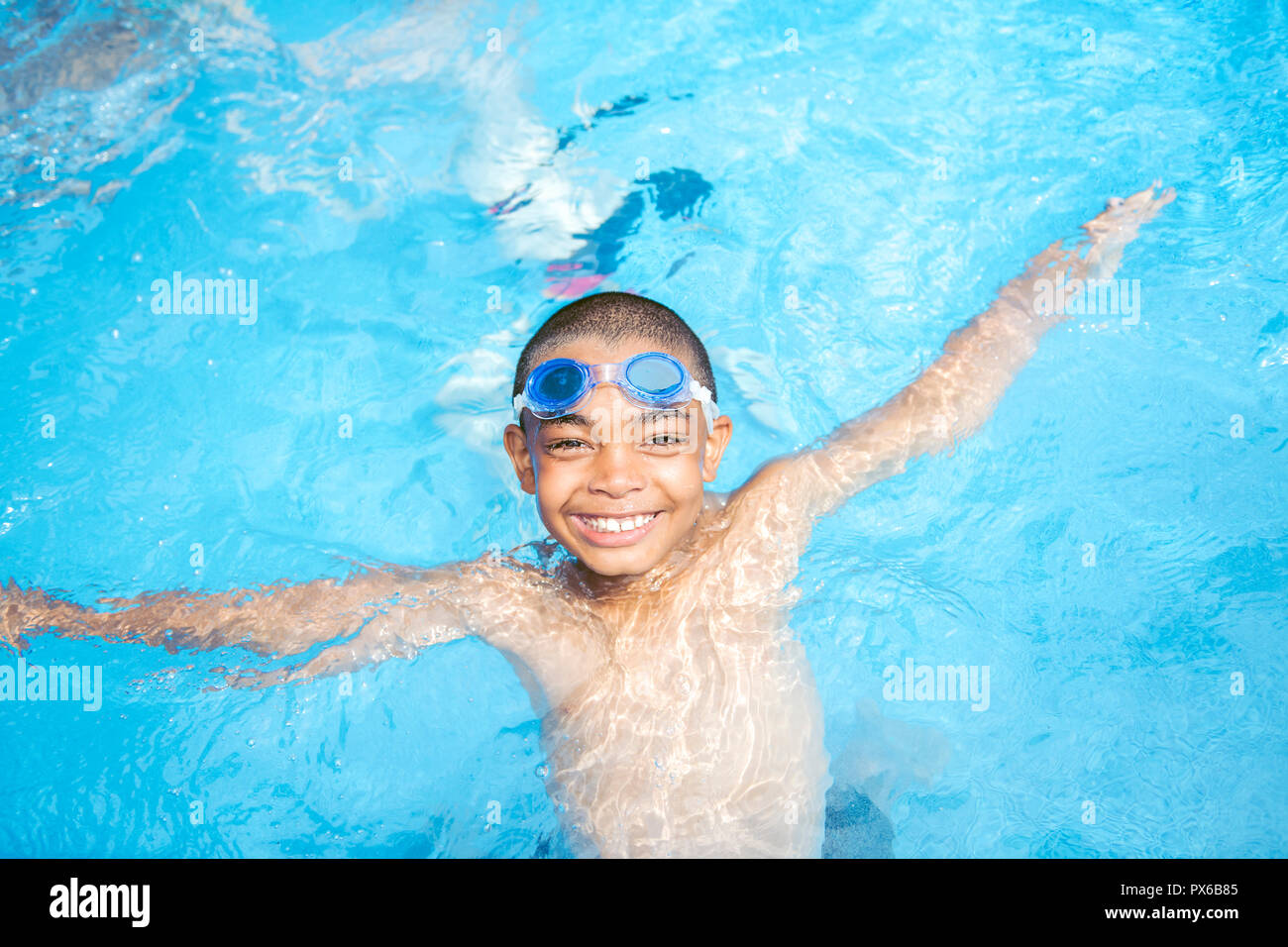A Portrait of boy having good time in swimming pool Stock Photo Alamy