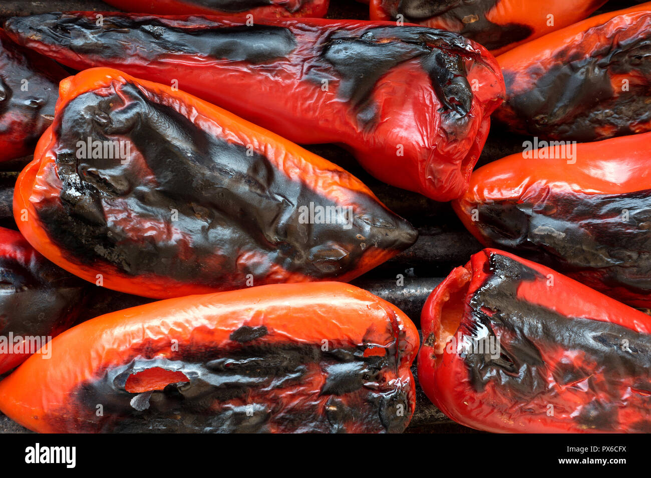 Roasted red peppers on the grill Stock Photo - Alamy