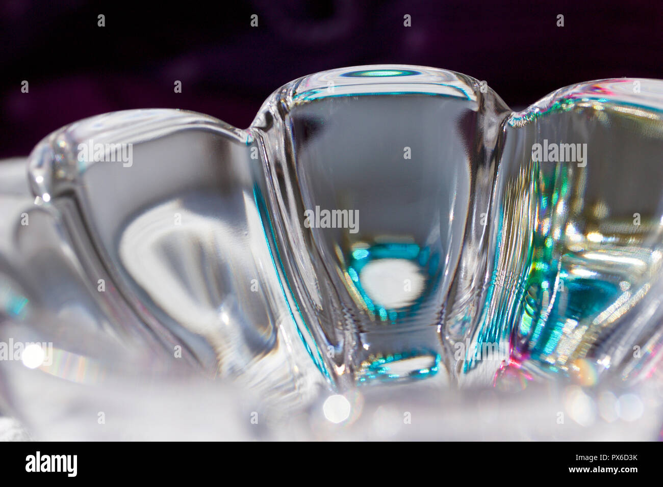Macro view of beautiful lead crystal glass with scalloped edges