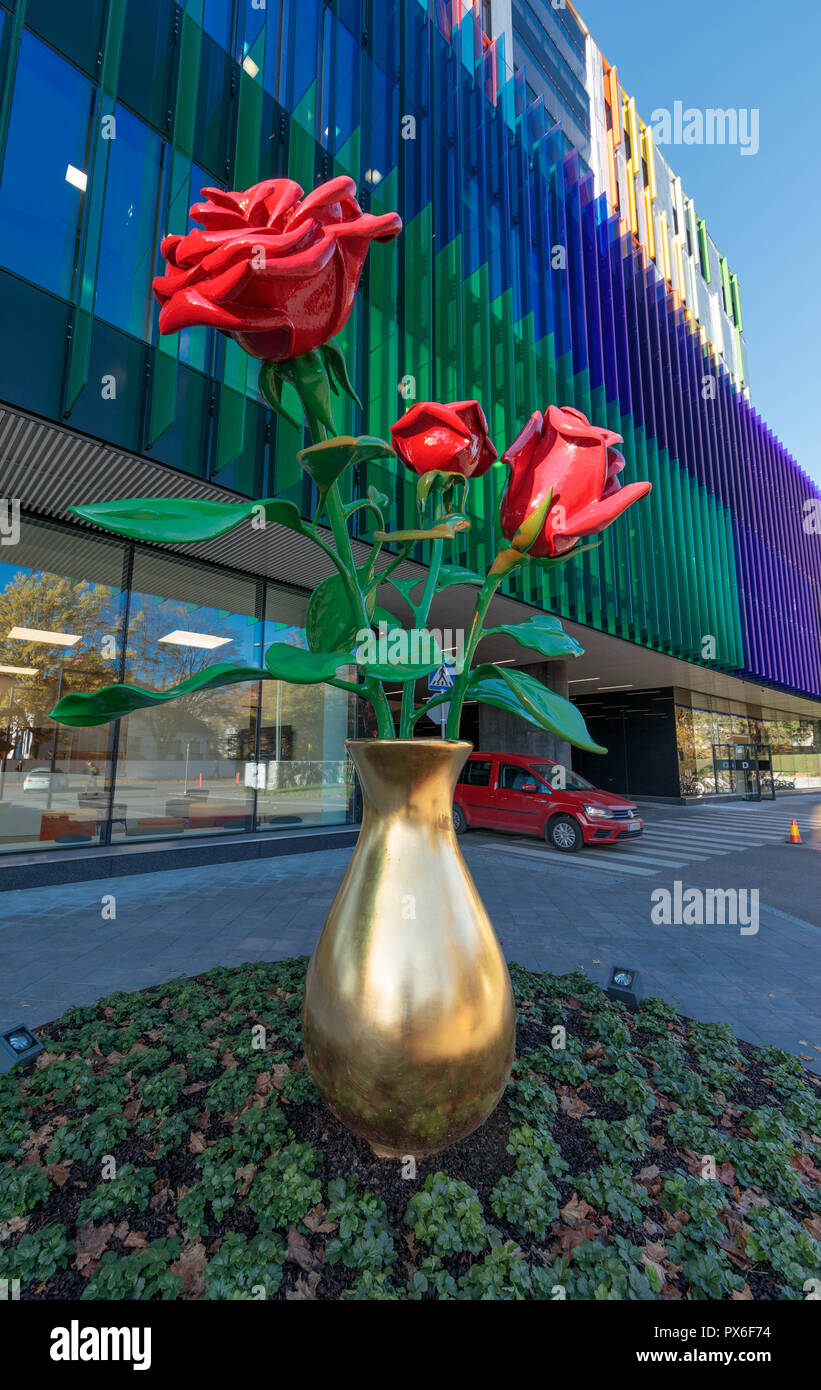 Helsinki New Children's Hospital opened for patients on 17 September 2018. Its colourful facade has sculpture with three red roses in a golden vase. Stock Photo