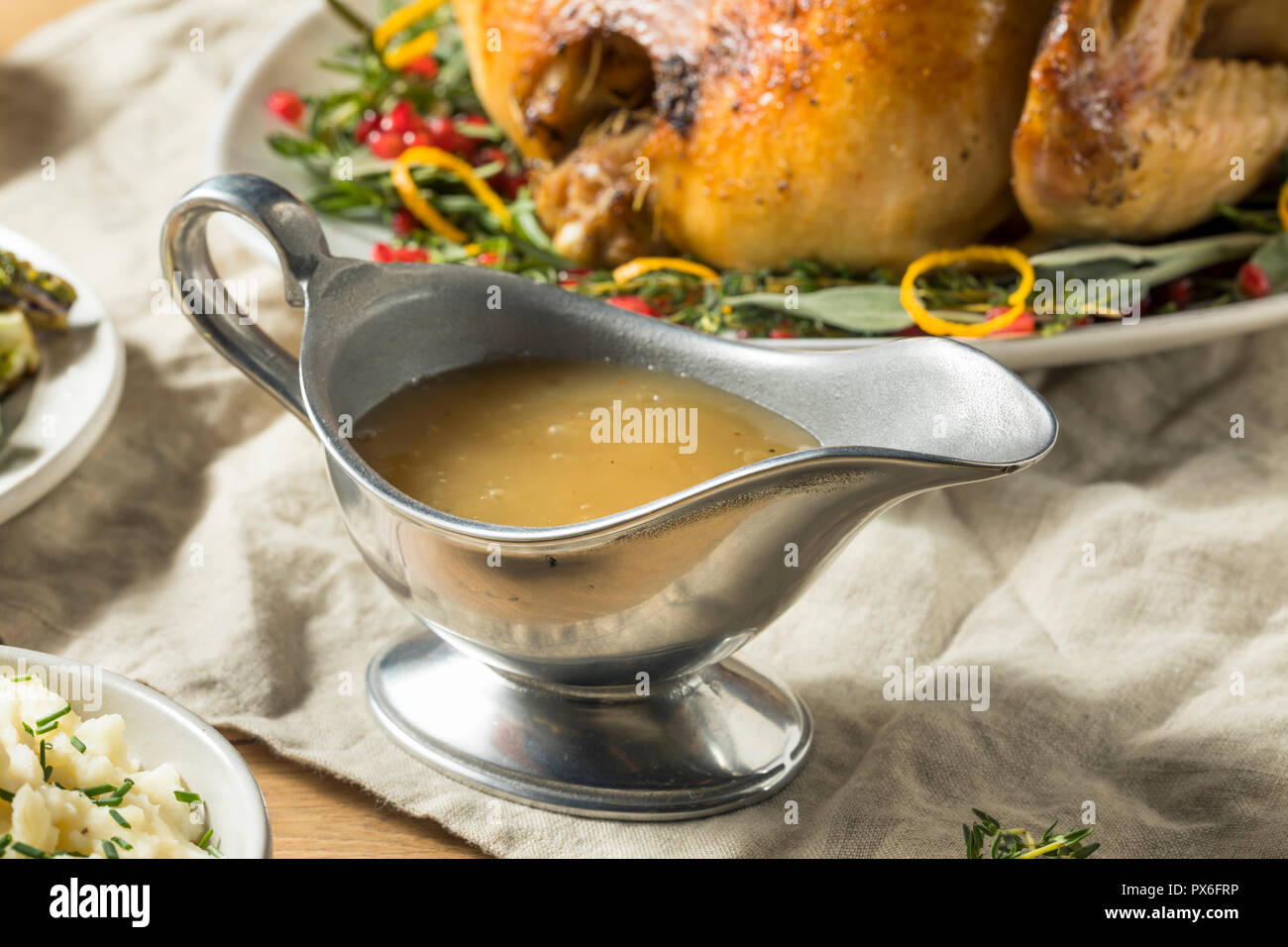 Gravy boat dinner table hi-res stock photography and images - Alamy
