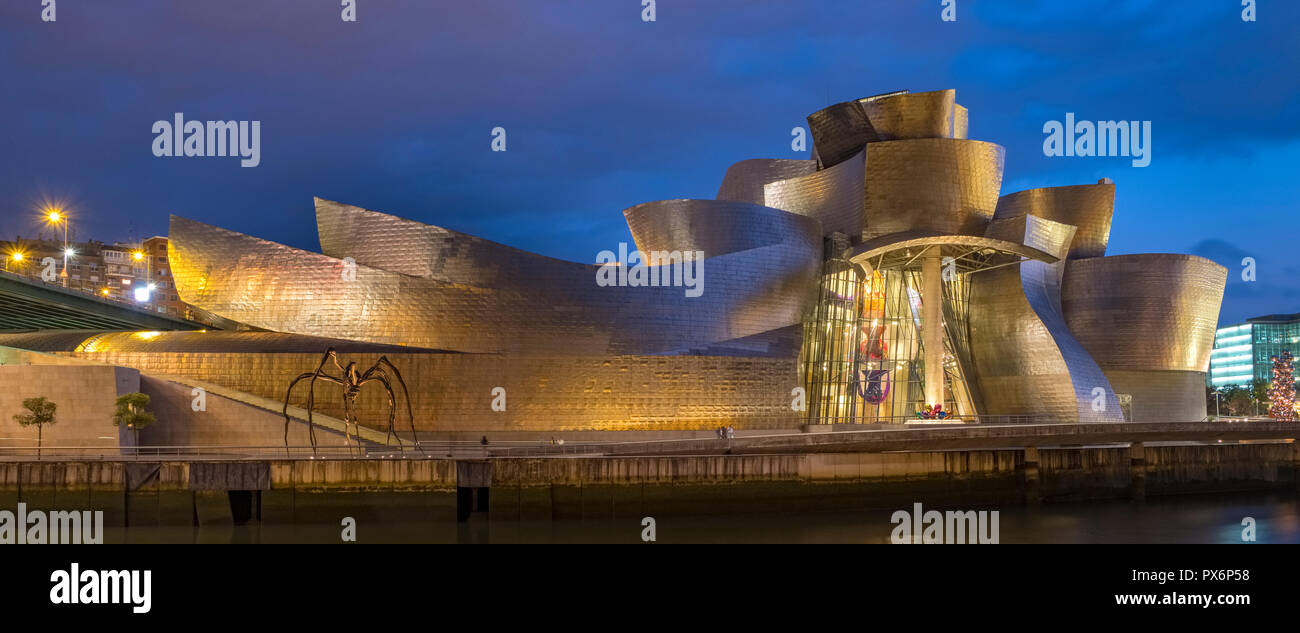 The Guggenheim Museum and spider art, Bilbao, Spain, Europe at night Stock Photo