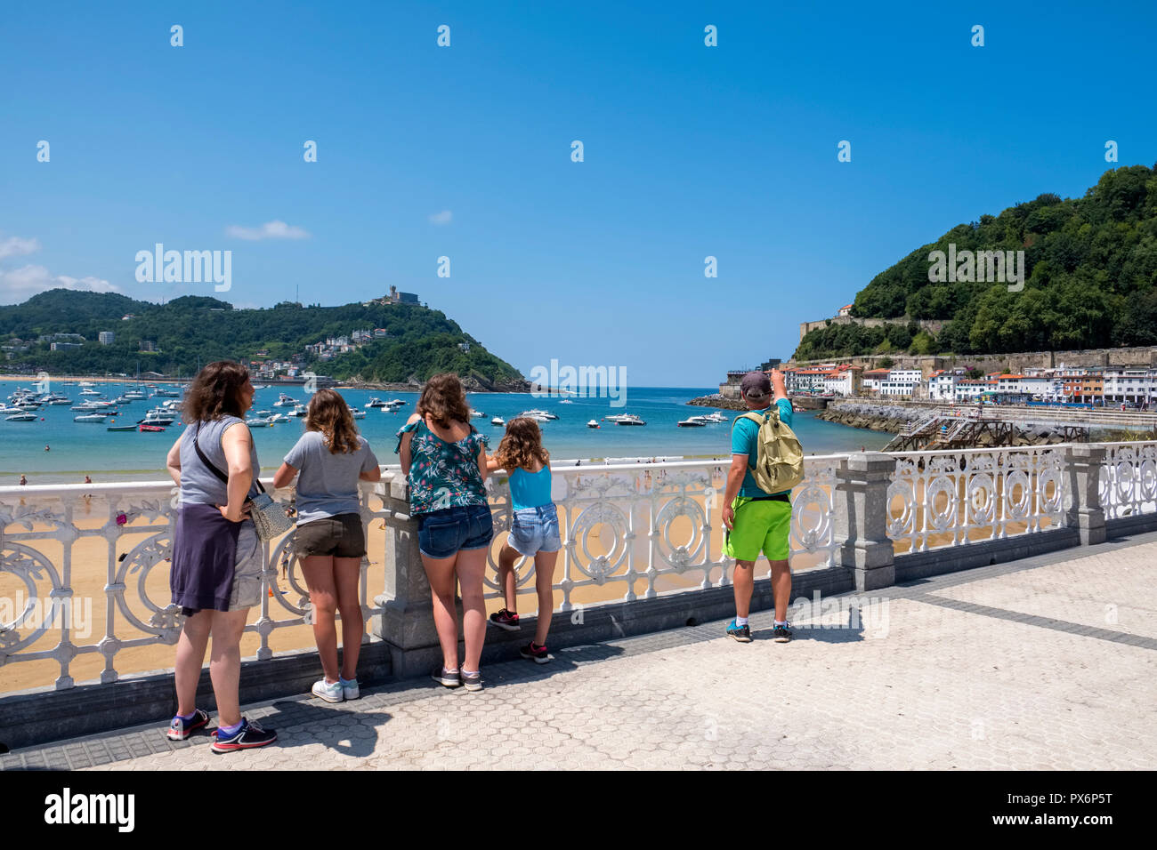 Tourists, promenade and coastline of San Sebastian, Donostia, in the Basque Country, Spain, Europe Stock Photo