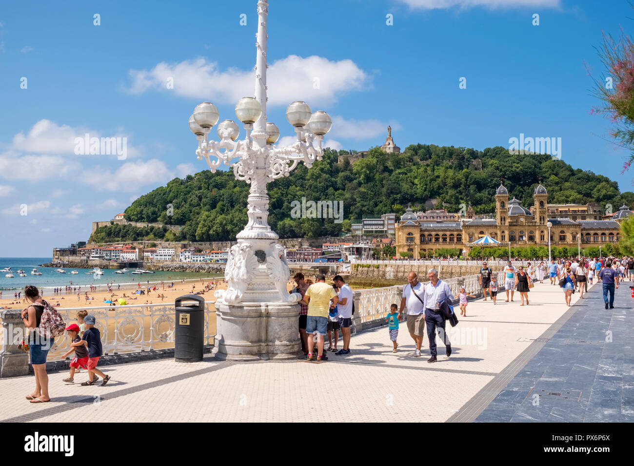 Tourists on the promenade at La Concha Bay, San Sebastian, Donostia, Basque Country, Spain, Europe Stock Photo