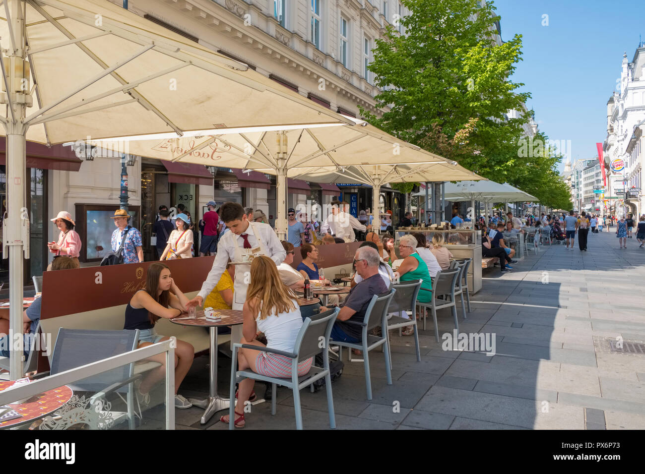 Vienna street pavement Cafe Sacher on Kartner Strasse in central Vienna, Austria, Europe Stock Photo