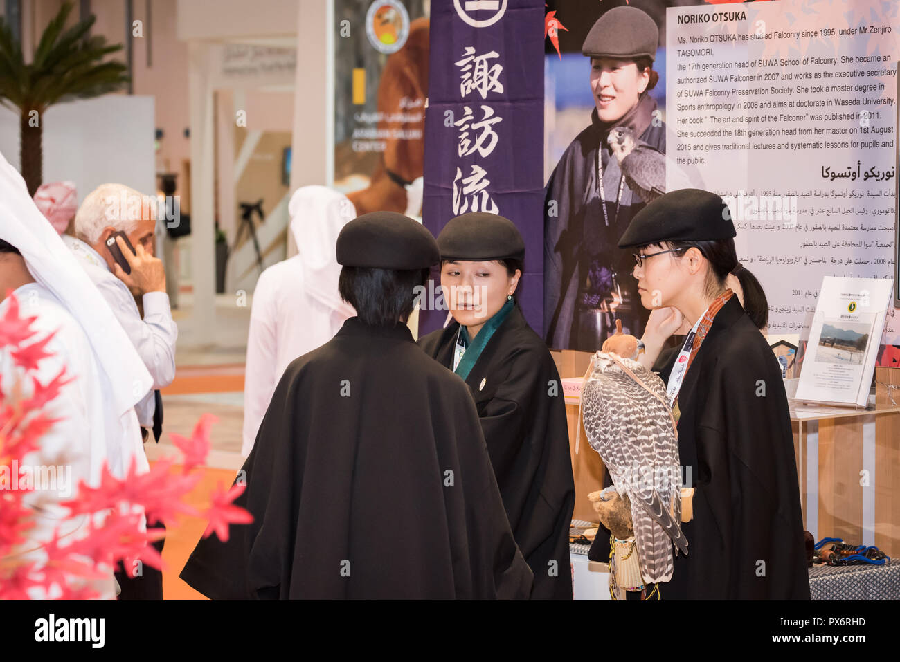 26 Sep 2018: Noriko Otsuka, A falconer of Suwa School of Falconry in tradional japanese falconry dress at Hunters Exhibition 2018, Abu Dhabi, UAE Stock Photo
