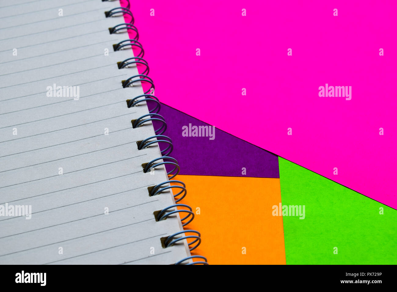 Opened book on colorful background Stock Photo