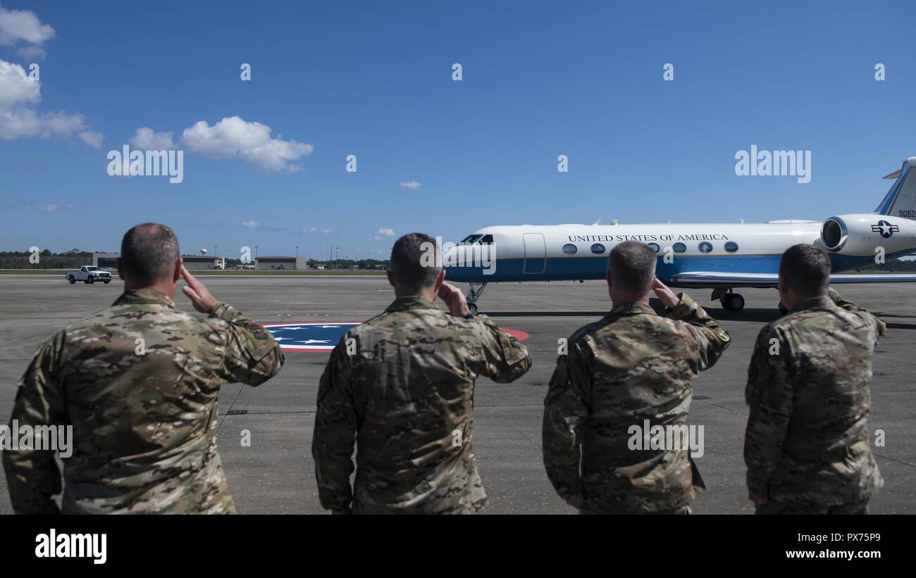 Air Force Special Operations Command and 1st Special Operations Wing senior leaders salute for the arrival of the Secretary of the Air Force Heather Wilson at Hurlburt Field, Florida, Oct. 14, 2018, October 14, 2018. Aircrew members with the 8th Special Operations Squadron transported Air Force senior leaders from Hurlburt Field to Tyndall Air Force Base to assess the damage from Hurricane Michael, one of the most intense tropical cyclones to ever hit the U.S. (U.S. Air Force photo by Senior Airman Joseph Pick). () Stock Photo