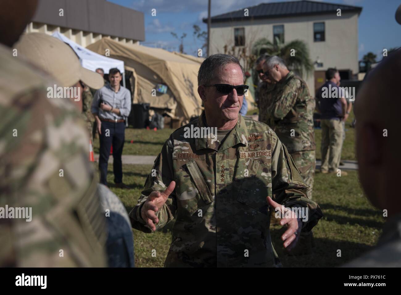 Air Force Chief of Staff Gen. David L. Goldfein speaks with Airmen at Tyndall Air Force Base, Florida, Oct. 14, 2018, October 14, 2018. Air Force senior leaders toured Tyndall Air Force Base to assess the damage from Hurricane Michael, one of the most intense tropical cyclones to ever hit the U.S. (U.S. Air Force photo by Senior Airman Joseph Pick). () Stock Photo