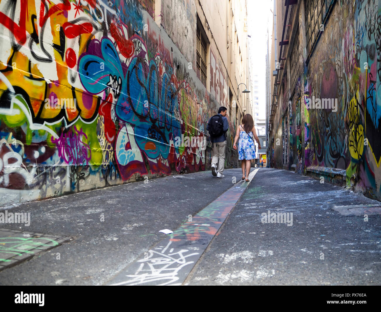 Tourists Admiring Street Art In Hosier Lane One Of Melbourne S Most Iconic Street Art Lane Ways And A Main Tourist Attraction Stock Photo Alamy