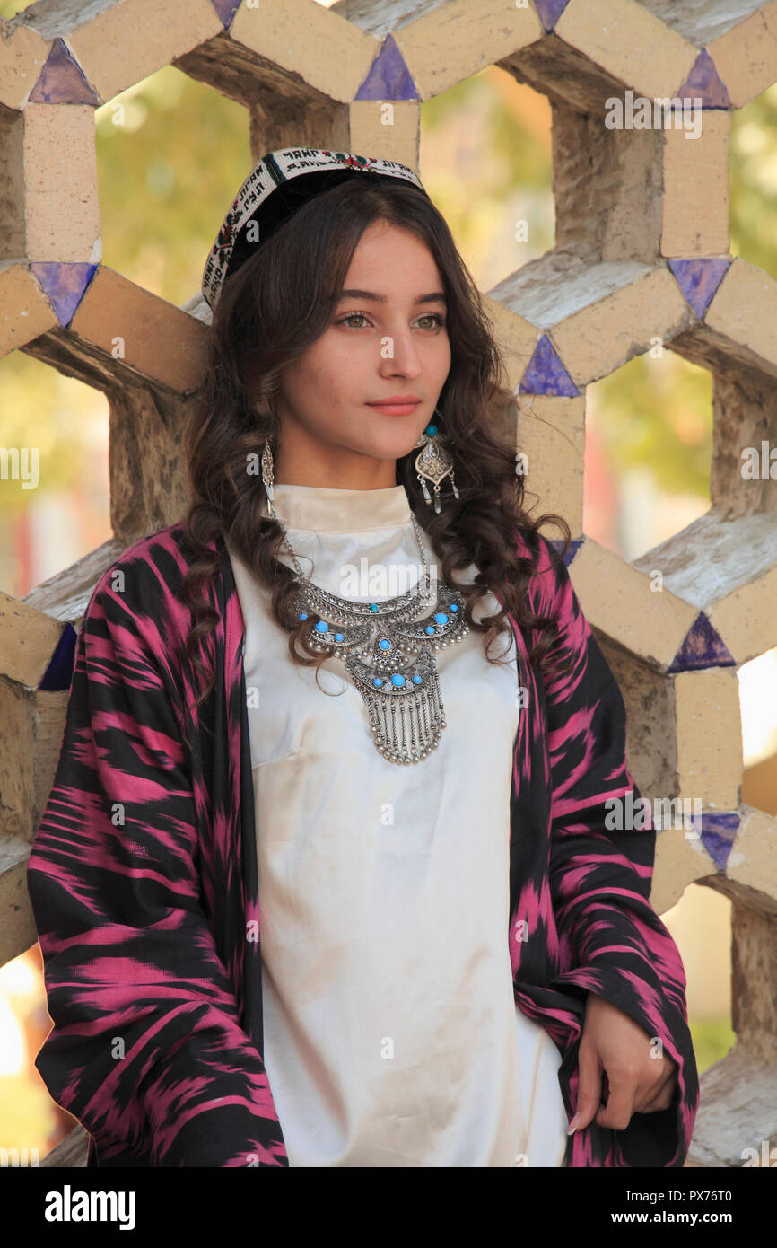 Uzbekistan, Samarkand, Registan; Ulug Beg madrasah, fashion model, woman, Stock Photo